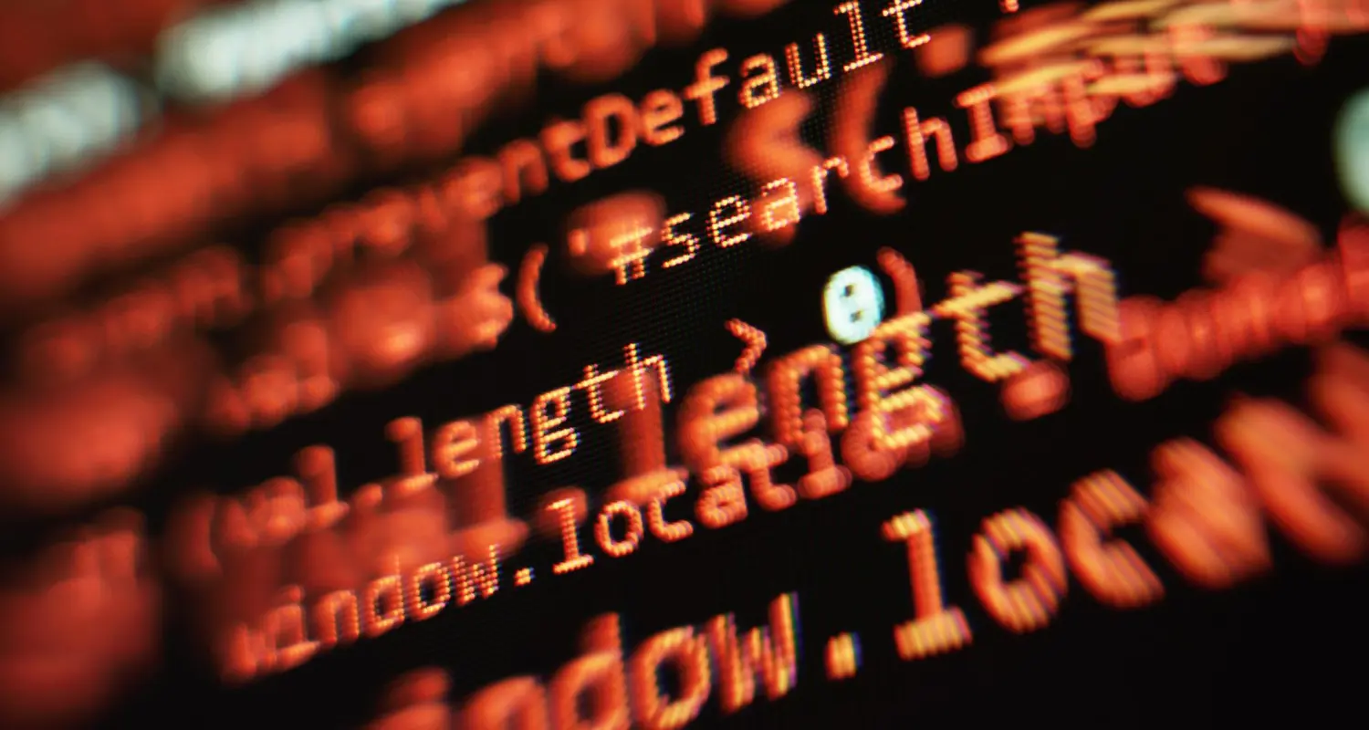 Imagem de uma tela com códigos de desenvolvimento, simbolizando o uso da linguagem Rust na programação.